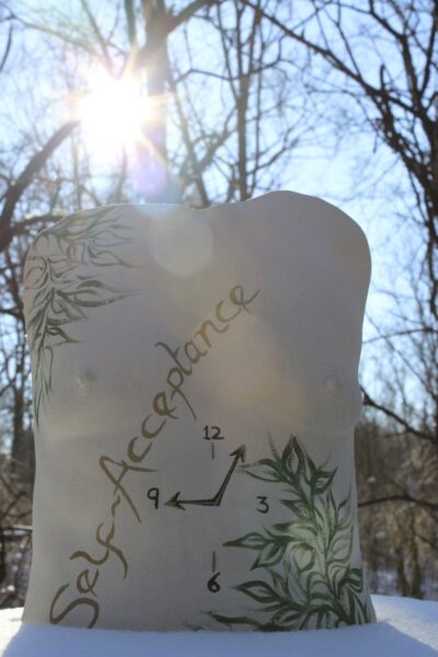 Self Acceptance in snow with sun flare